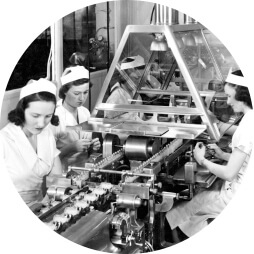 Women working in a manufacturing facility to mass-produce Penicillin-G