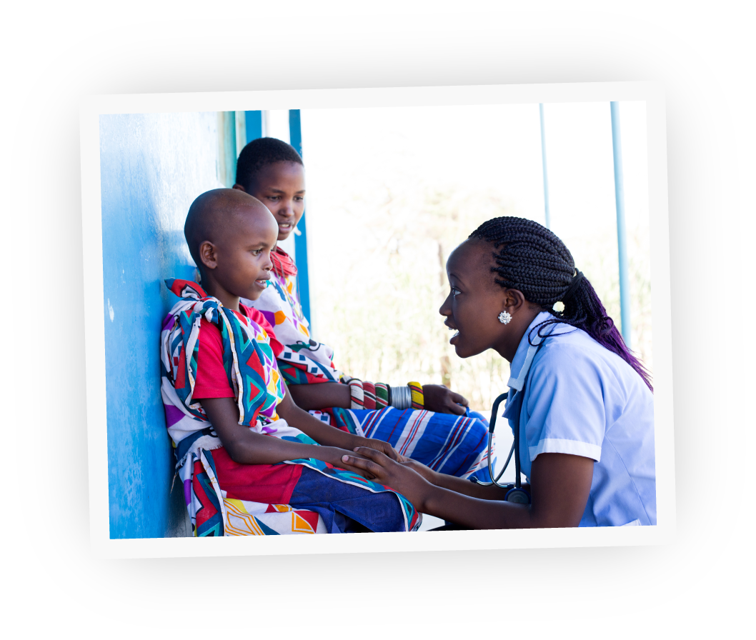 Physician talking to two children